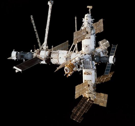 The Russian space station Mir in orbit against the blackness of space